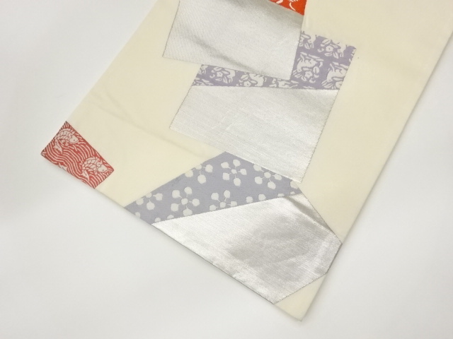  色紙に古典柄模様織出し袋帯